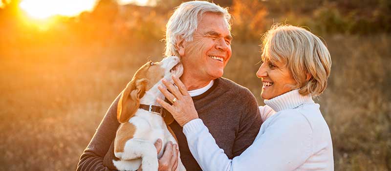 401(k) Retirees on Walk with Dog